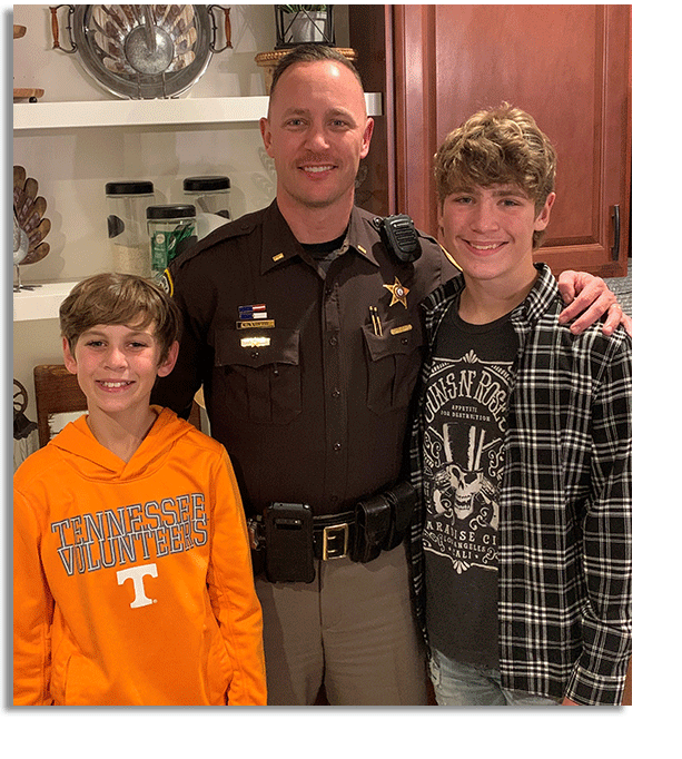 officer with sons